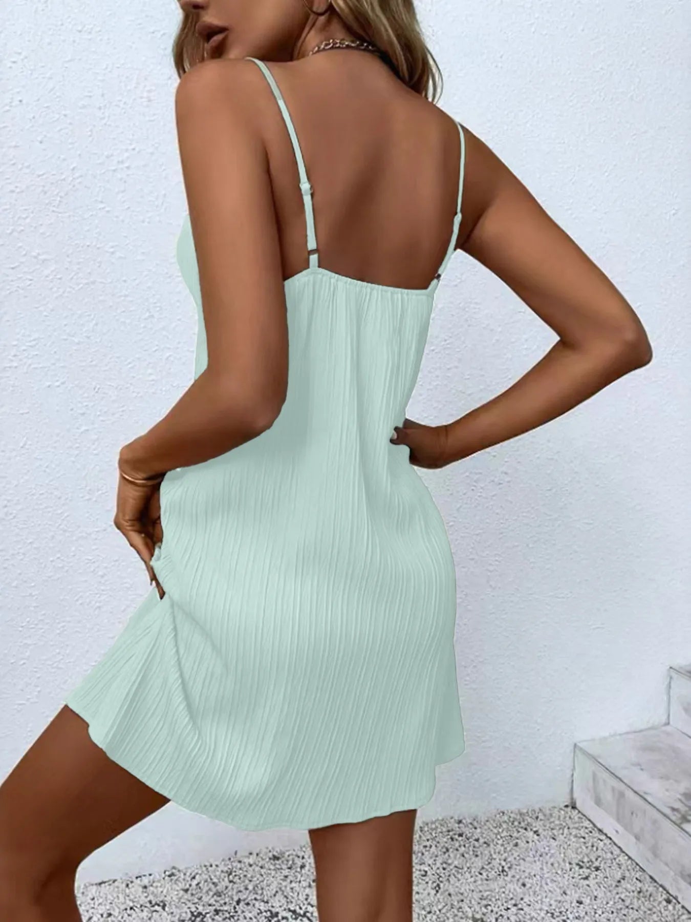 Back view of Button Front Cami Dress, showing clean lines and relaxed fit for casual styling.