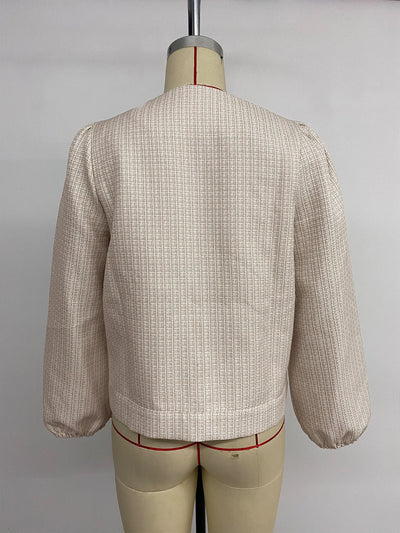 Angled back view of Button Front Jacket with Pocket Details on model, emphasizing fabric texture and fit.