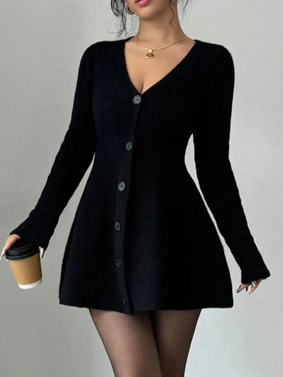 Close-up of the V-neckline and buttoned front on Button Front V-Neck Knit Dress, showing knit detail.