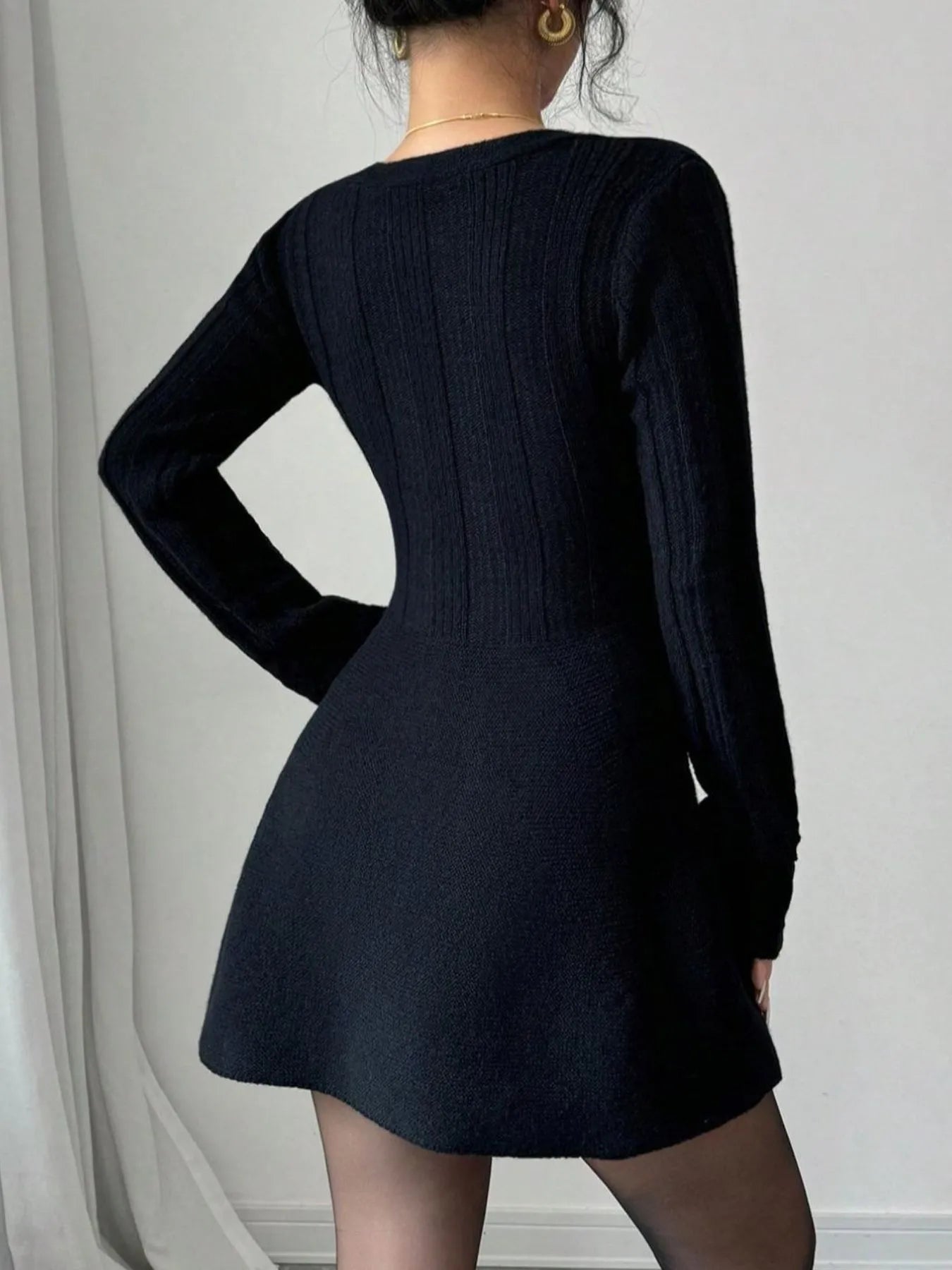 Full-body view of model wearing Button Front V-Neck Knit Dress, showing overall fit and style.