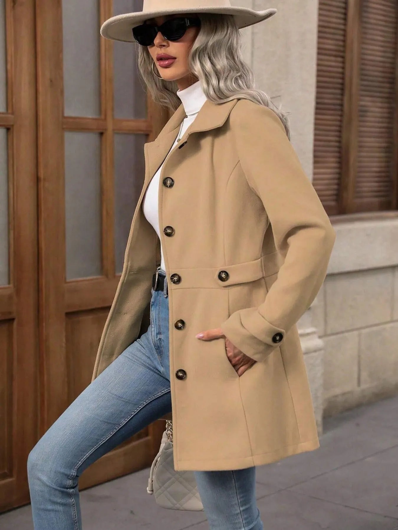 "Back view of model wearing Button Up Long Sleeve Coat, showing overall structure and fit.