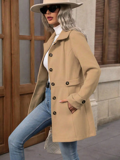 "Back view of model wearing Button Up Long Sleeve Coat, showing overall structure and fit.