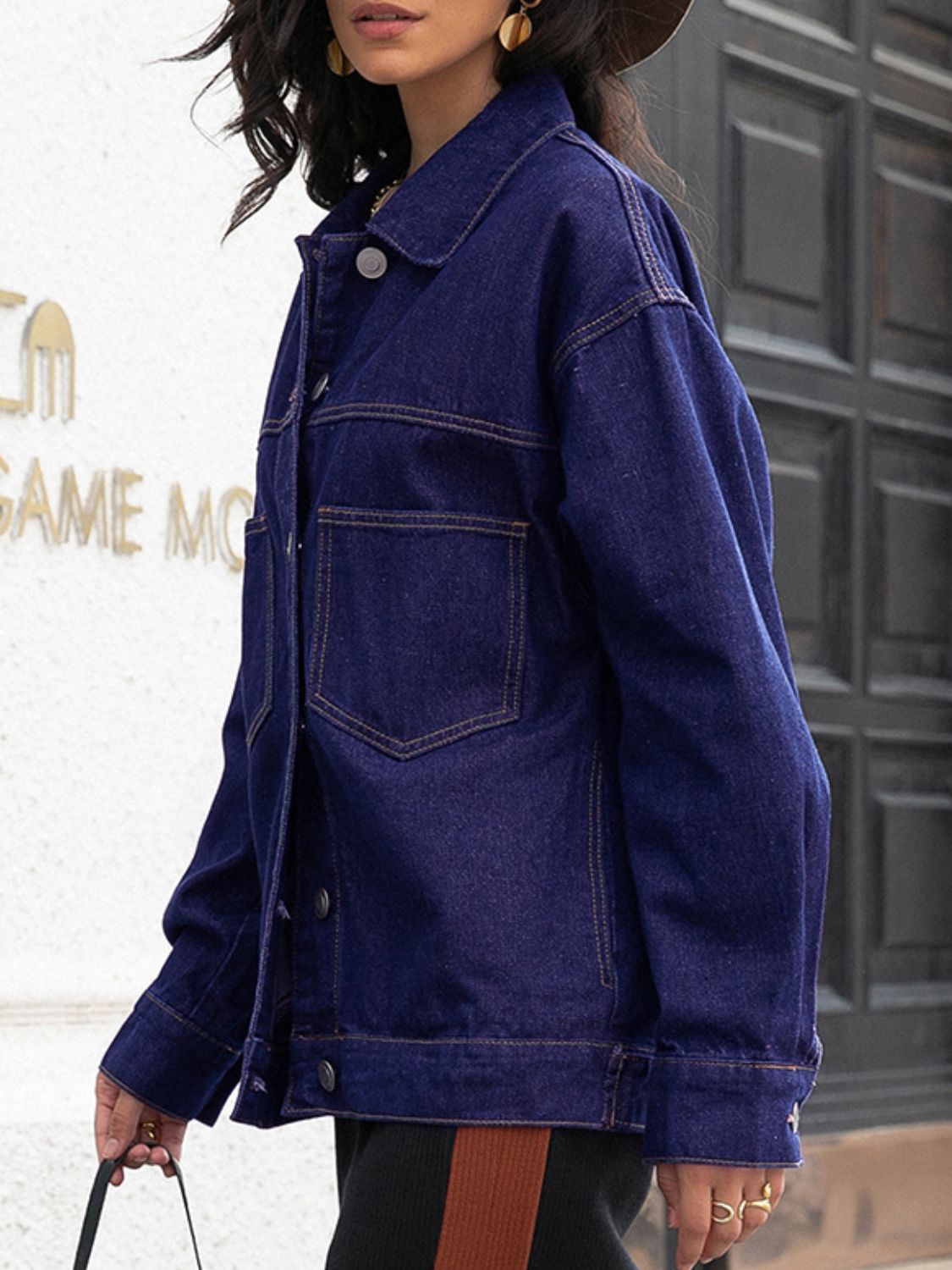 Model wearing Buttoned Denim Jacket, showcasing overall fit and casual styling.