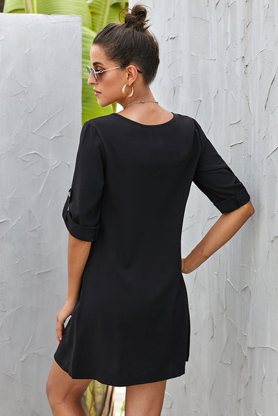 Close-up of the back of Buttoned V-Neck Dress, showing fabric detail and stitching.