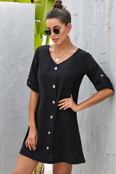 Close-up of the buttoned front and V-neckline of Buttoned V-Neck Dress, showing fabric texture.