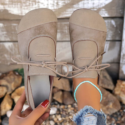 Angled side view of Casual Lace-Up Loafers, showcasing the shape and fit of the shoe.