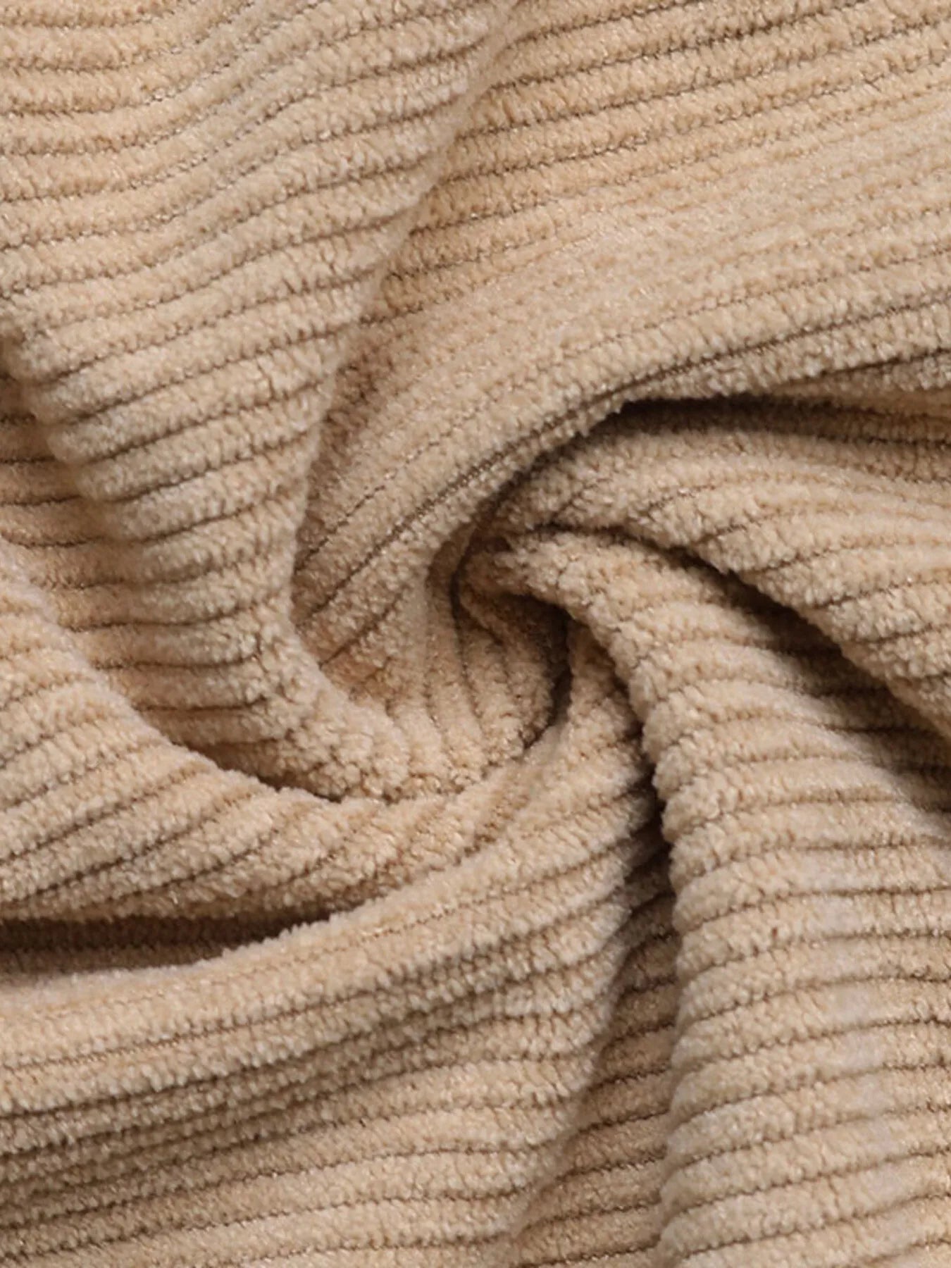 Back view of model wearing Corduroy Overall Dress with Pocket, showcasing the straps and overall relaxed design.