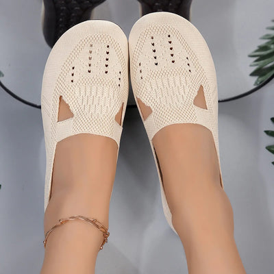 Angled back view of Cutout Mesh Slip-Ons, showing heel shape and slip-on functionality.