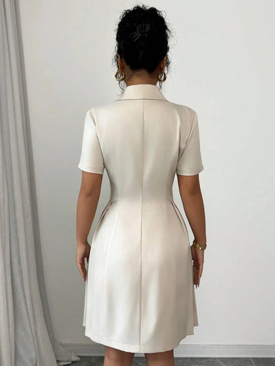 Model wearing Double Breasted Short Sleeve Dress, showing the front fit and structured design.