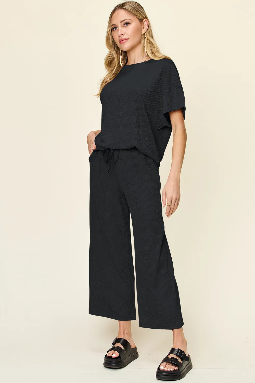 Back close-up of Double Take Texture T-Shirt and Wide Leg Pants, highlighting relaxed silhouette and fabric.