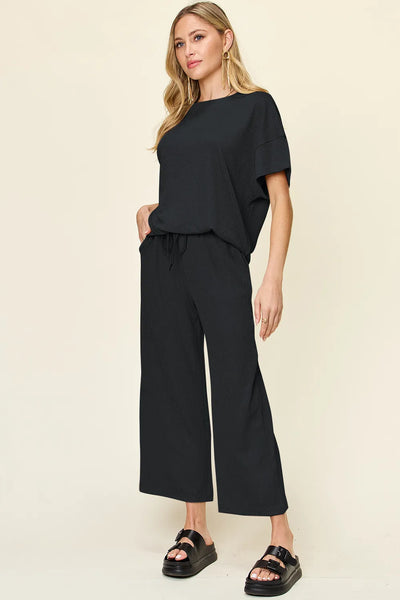 Back close-up of Double Take Texture T-Shirt and Wide Leg Pants, highlighting relaxed silhouette and fabric.