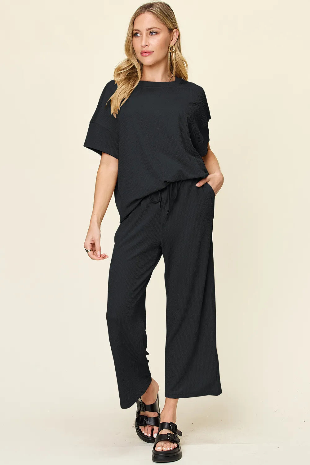 Front close-up of Double Take Texture T-Shirt and Wide Leg Pants on model, showing fabric and fit.