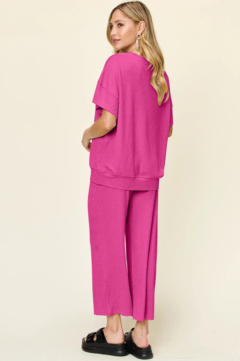 Angled view of wide-leg pants in Double Take Texture Set, showing flowy silhouette and fit.