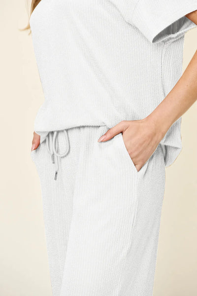 Back view of wide-leg pants in Double Take Texture Set on model, showing relaxed fit and flow.