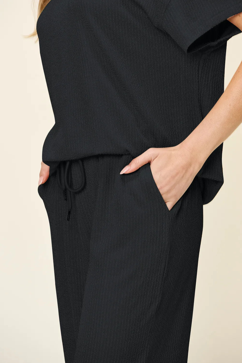 Close-up of pants pockets in Double Take Texture Set, emphasizing practical and stylish elements.