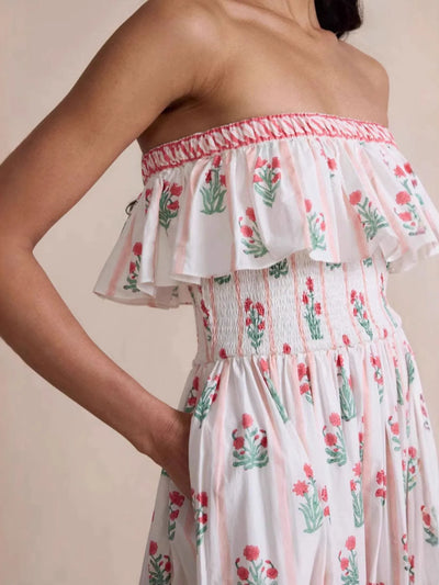 Model wearing Floral Strapless Ruffle Dress, showing the front view and overall fit.