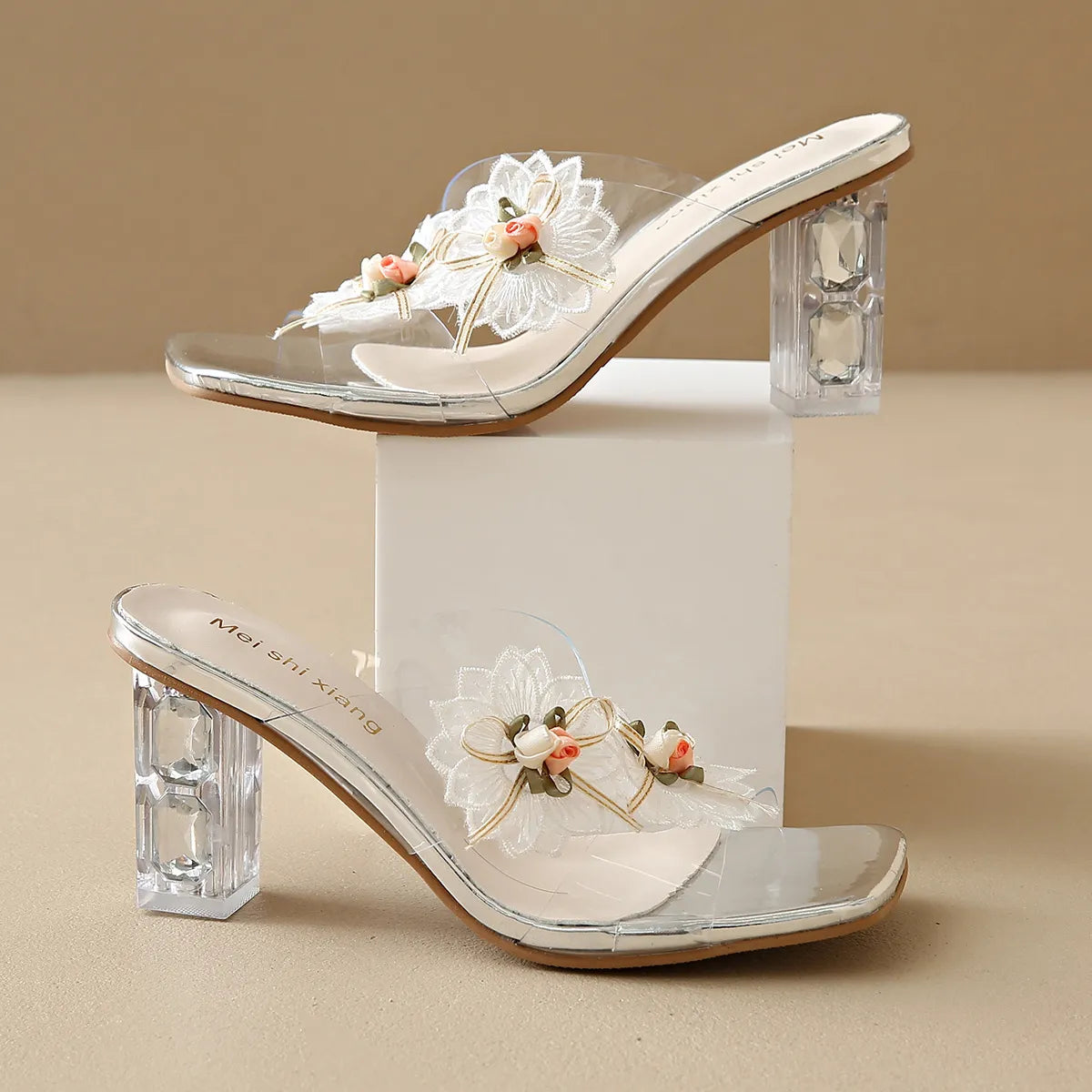 Front view of Flower Clear Block Heel Sandals in nude, featuring transparent straps and a stylish block heel.