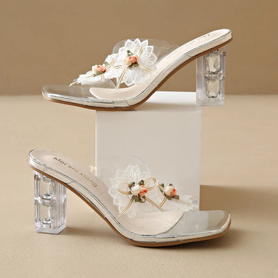 Front view of Flower Clear Block Heel Sandals in nude, featuring transparent straps and a stylish block heel.