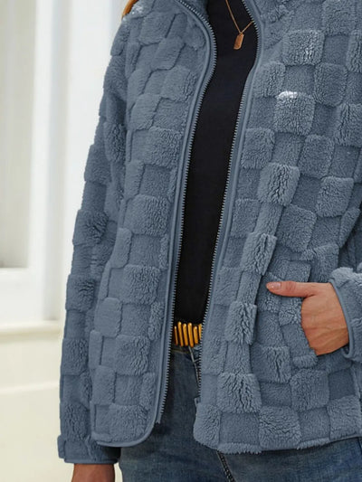 Close-up of the back of Fuzzy Checkered Zip-Up Jacket, emphasizing the fuzzy checkered design and stitching.