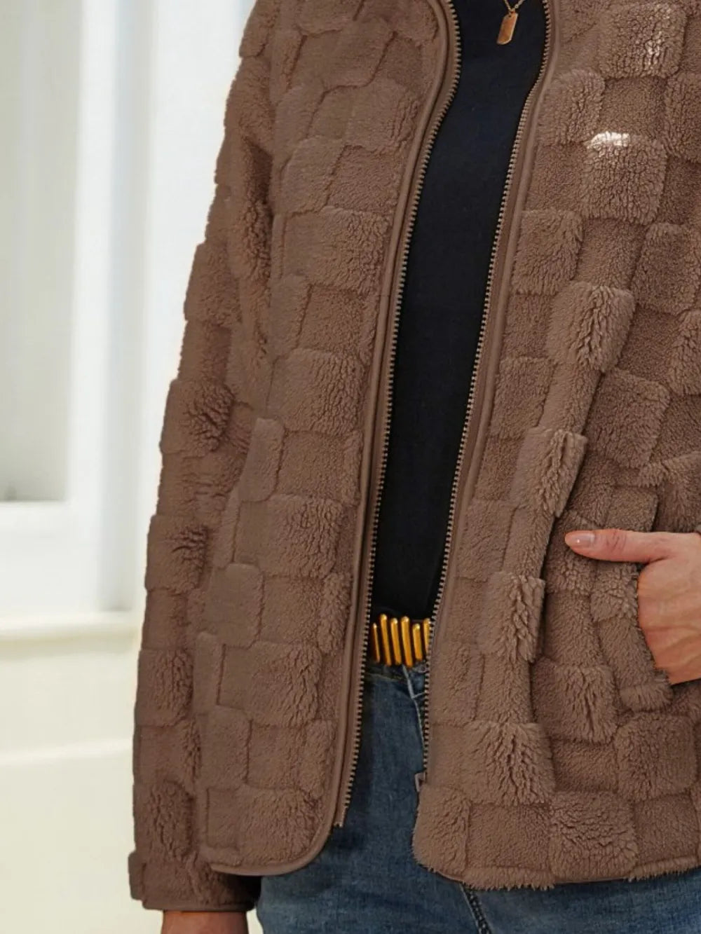 Close-up of the front texture and pattern of the Fuzzy Checkered Zip-Up Jacket, emphasizing quality and design.
