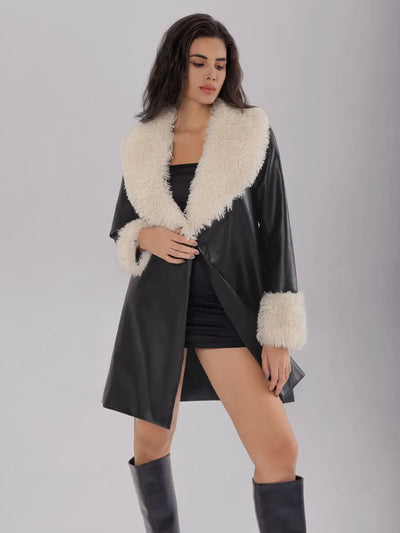 Detailed view of the sleeves on Fuzzy Long Sleeve Longline Coat, emphasizing the relaxed fit and fuzzy fabric.