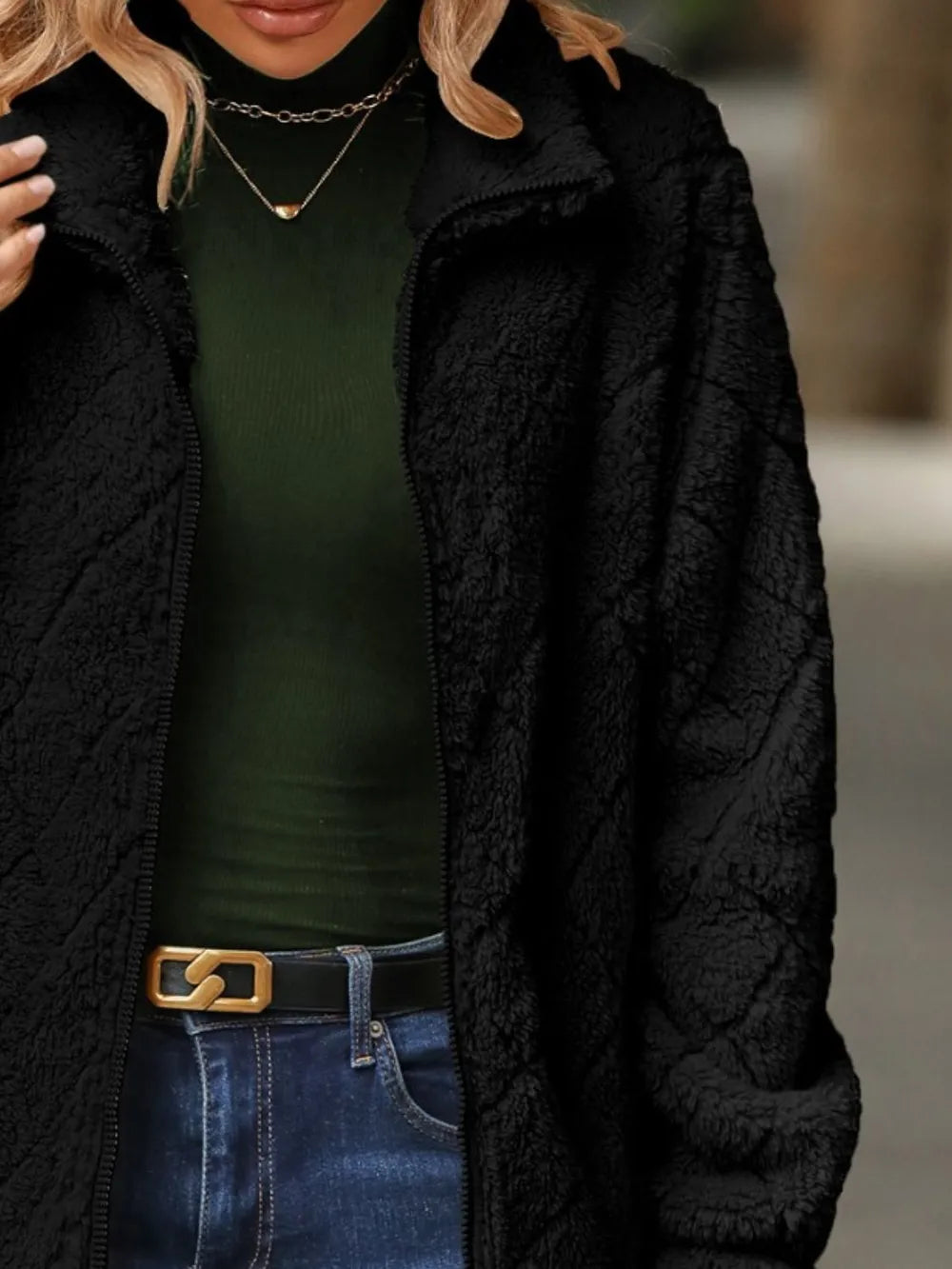 Close-up of the front texture of Fuzzy Pocketed Zip-Up Jacket, emphasizing the soft fuzzy material.