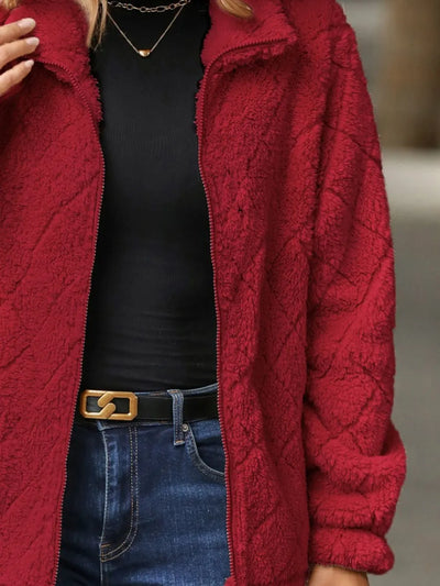 Front view of Fuzzy Pocketed Zip-Up Jacket unzipped, displaying inner lining and relaxed fit.