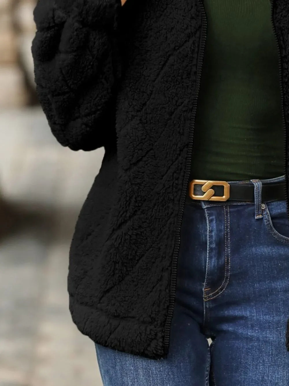 Side view of Fuzzy Pocketed Zip-Up Jacket on model, highlighting the relaxed fit and cozy design.