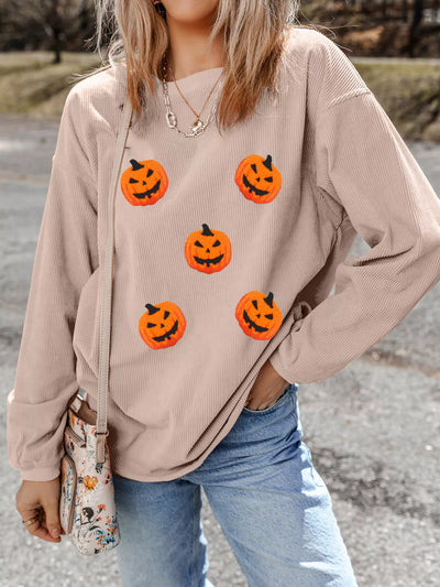 Front view of Halloween Pumpkin Drop Shoulder Sweatshirt in orange with pumpkin print, featuring a relaxed fit and drop shoulder design.