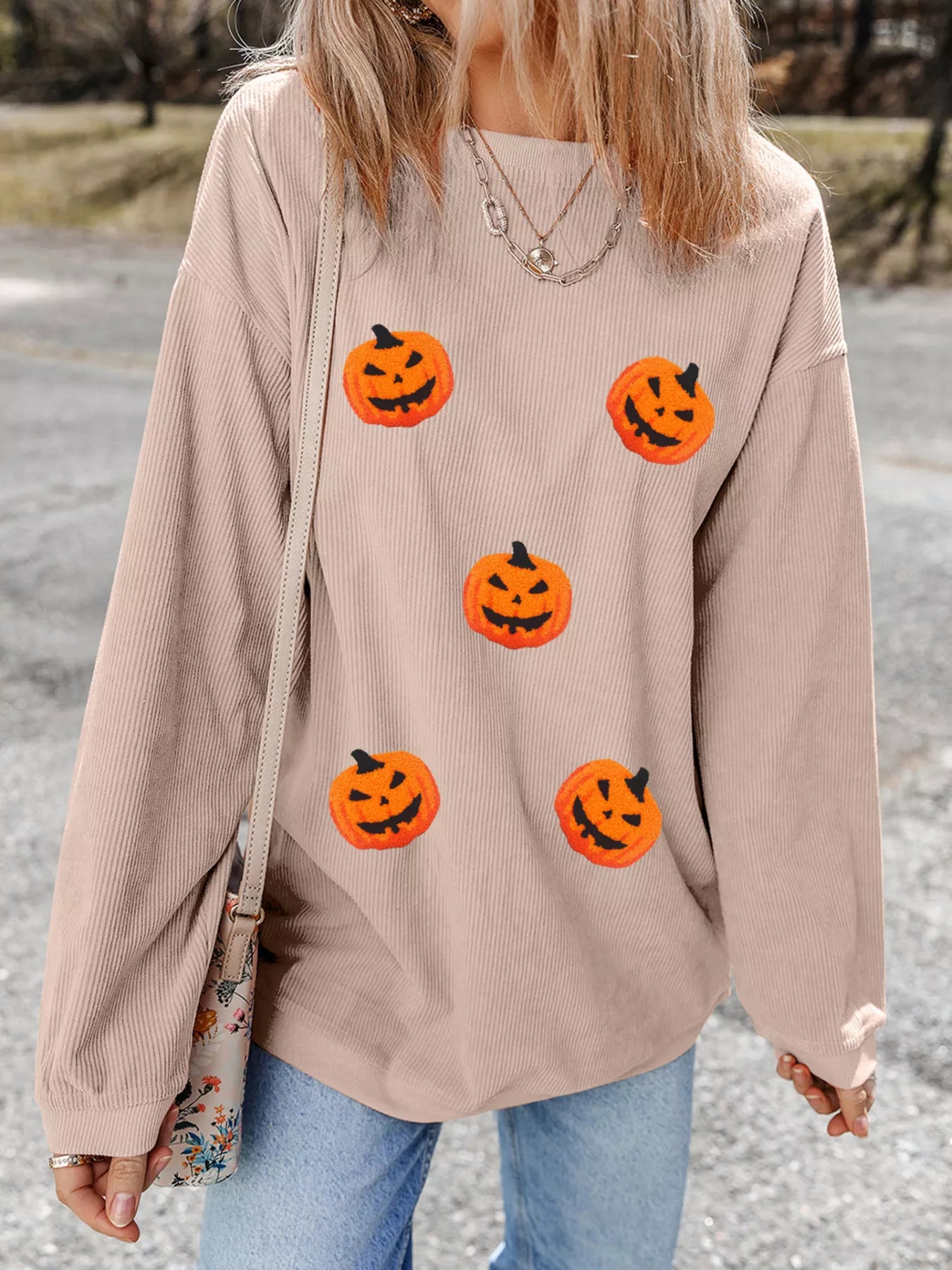 "Back view of Halloween Pumpkin Drop Shoulder Sweatshirt, highlighting the simple back design and relaxed fit.