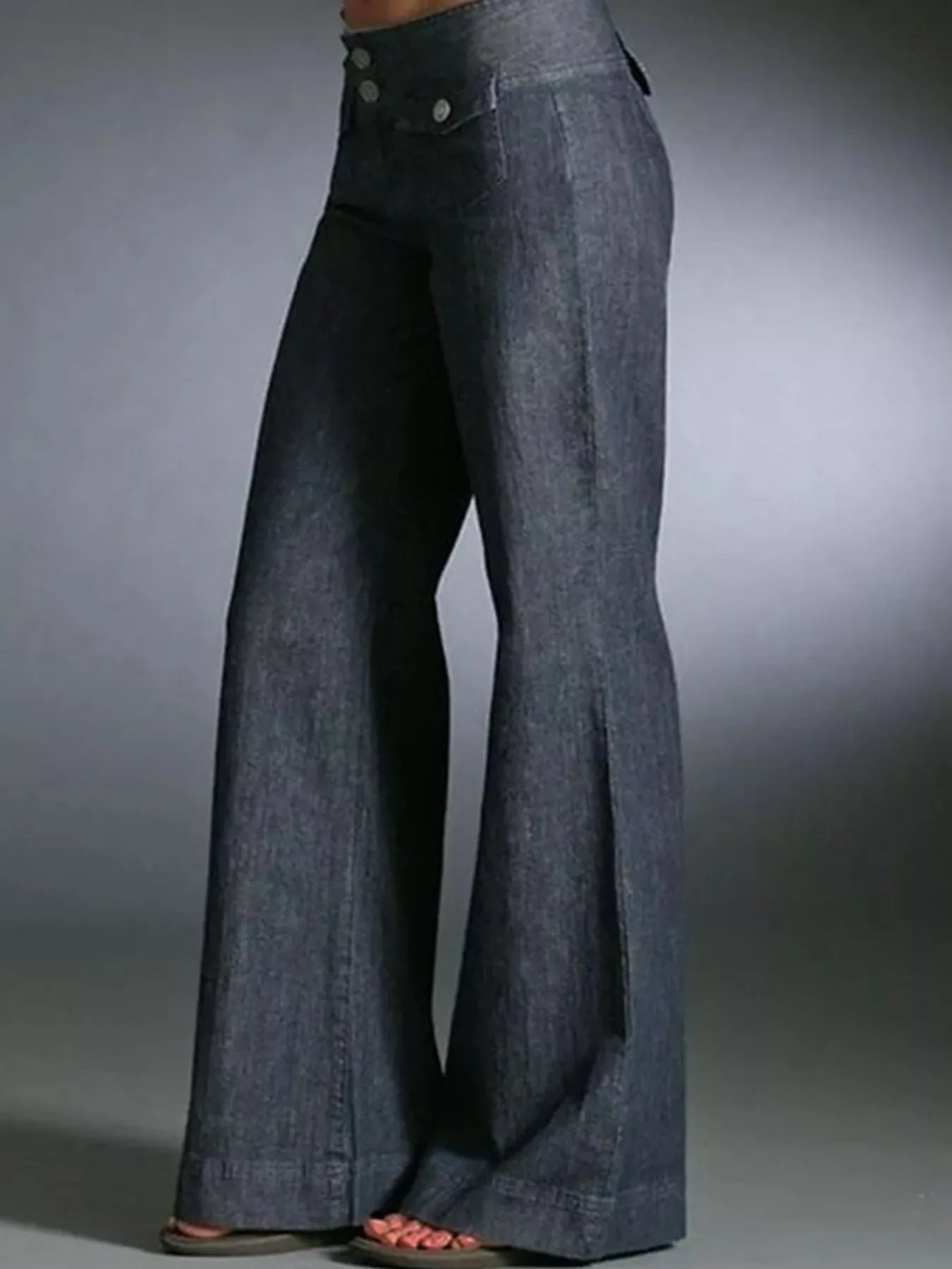 ide view of Full Size High-Waisted Wide Leg Wash Jeans, highlighting the wide-leg silhouette and relaxed fit.