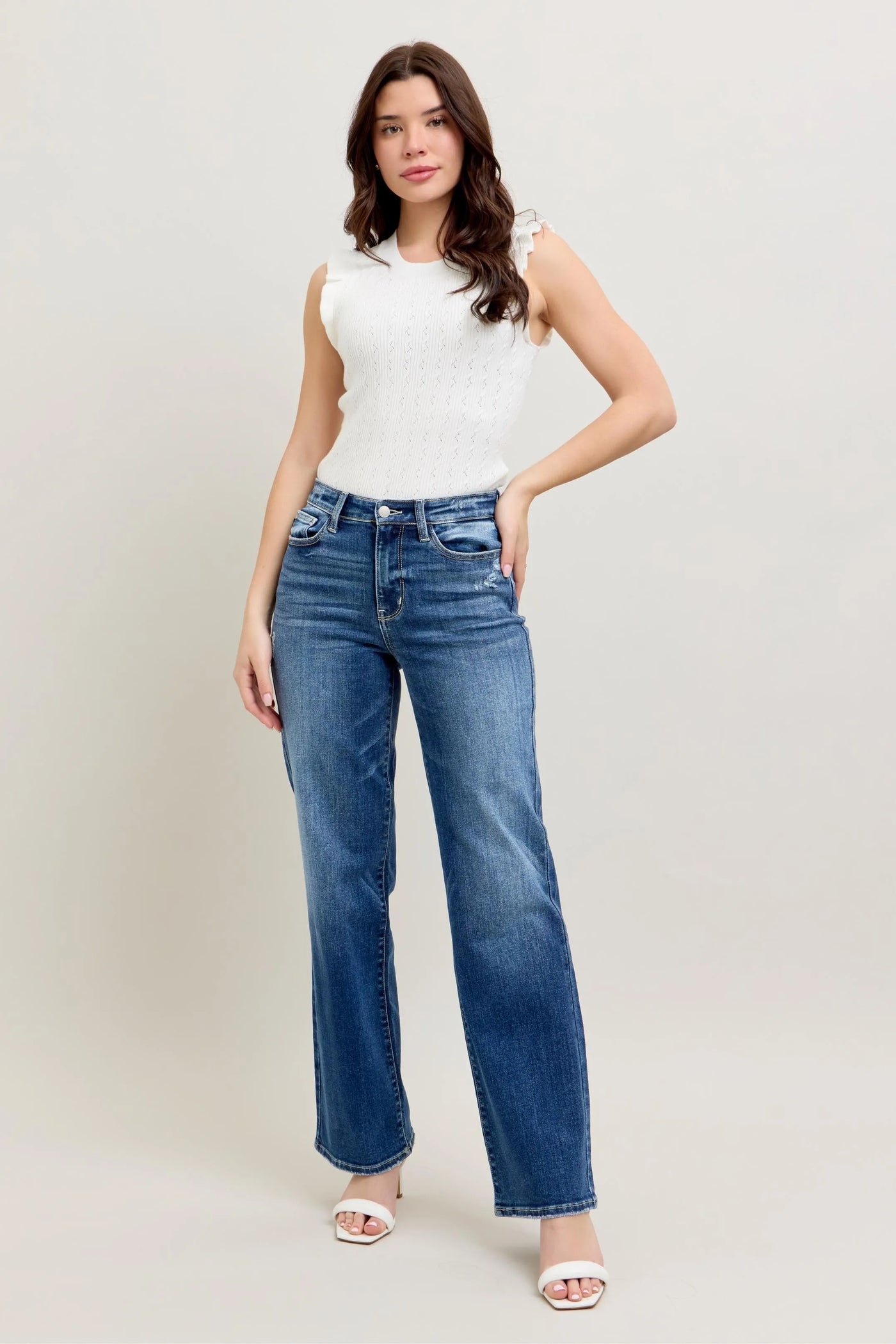 Full-length view of the plus-size model wearing Judy Blue High-Waist 90s Straight Leg Jeans, emphasizing the vintage-inspired fit.