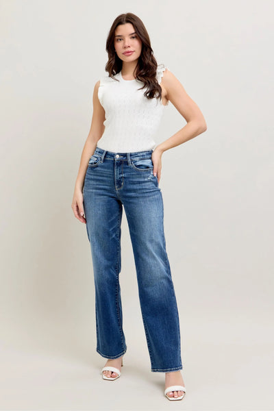 Full-length view of the plus-size model wearing Judy Blue High-Waist 90s Straight Leg Jeans, emphasizing the vintage-inspired fit.