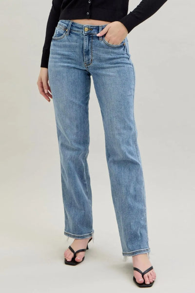 Judy Blue Frayed Hem Cell Phone Pocket Dad Jeans in light wash, showcasing the relaxed dad fit and frayed hem details.