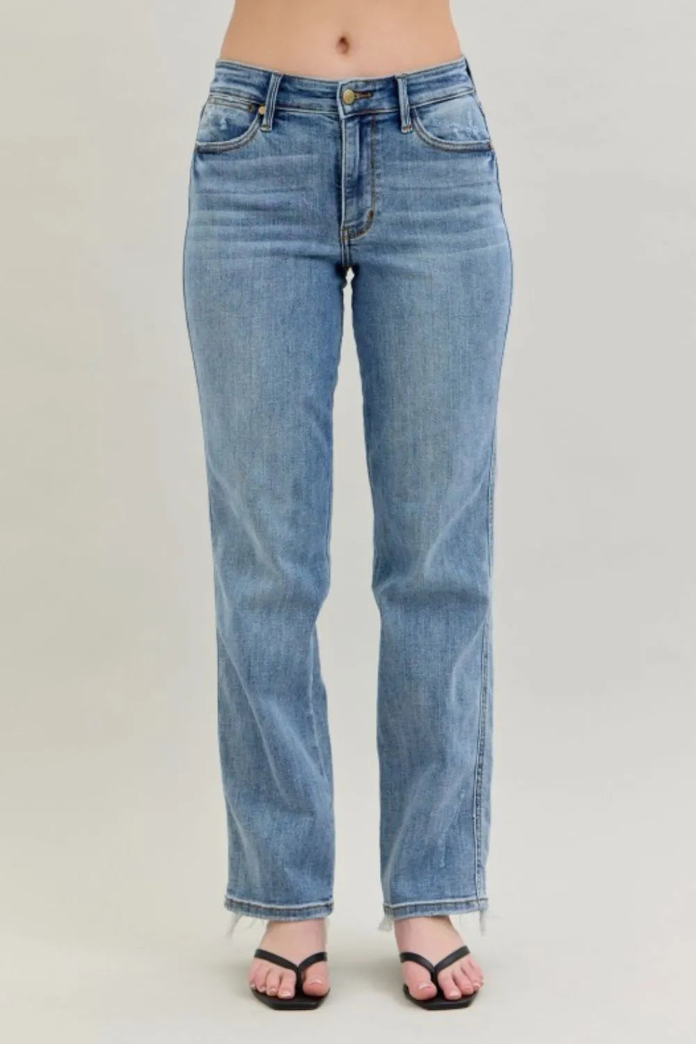 Side view of Judy Blue Frayed Hem Cell Phone Pocket Dad Jeans, highlighting the relaxed fit and stylish frayed hem design.