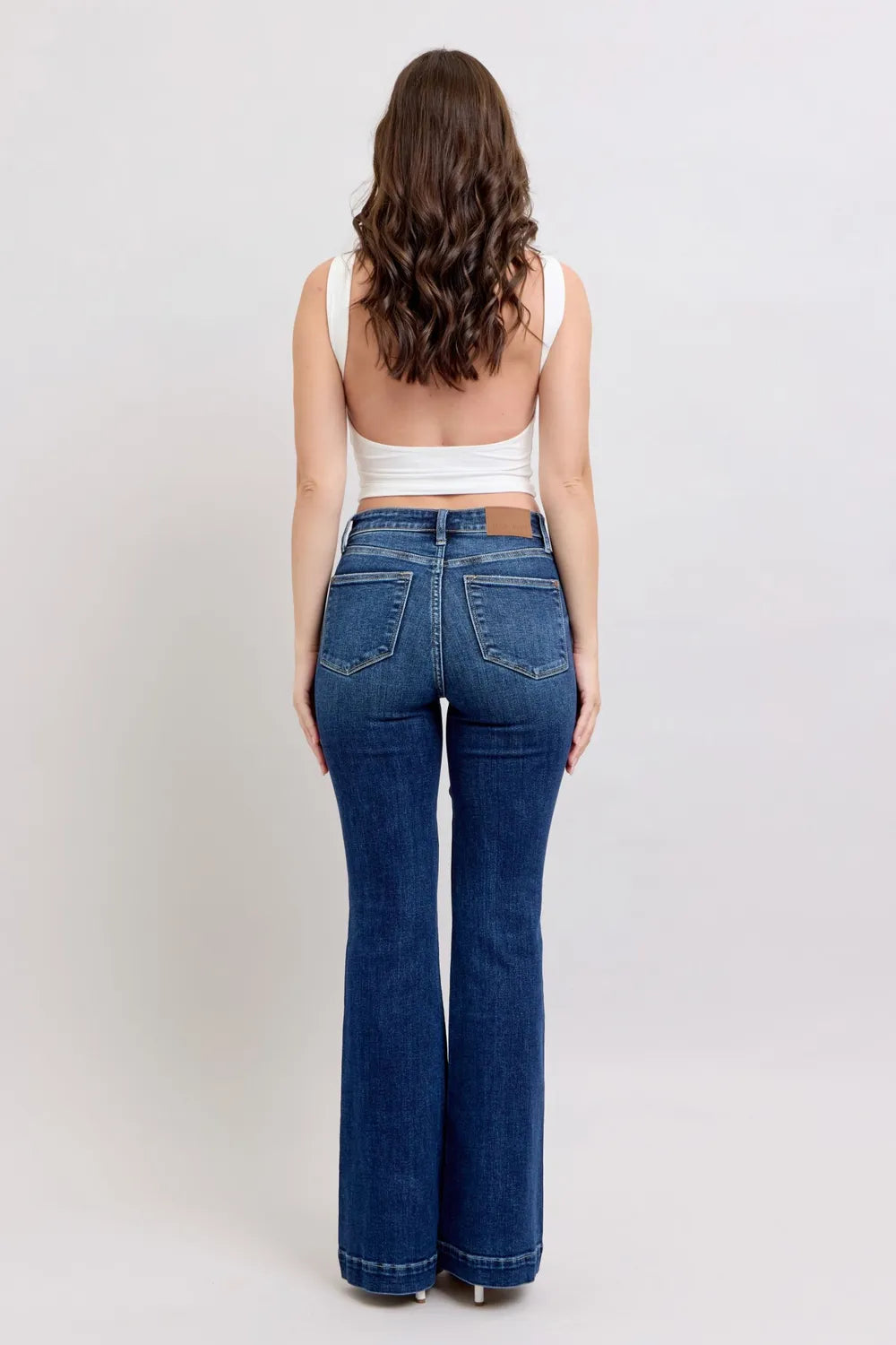 lose-up of the light wash denim of Judy Blue High-Rise Flare Jeans, showing off the premium fabric and timeless style.