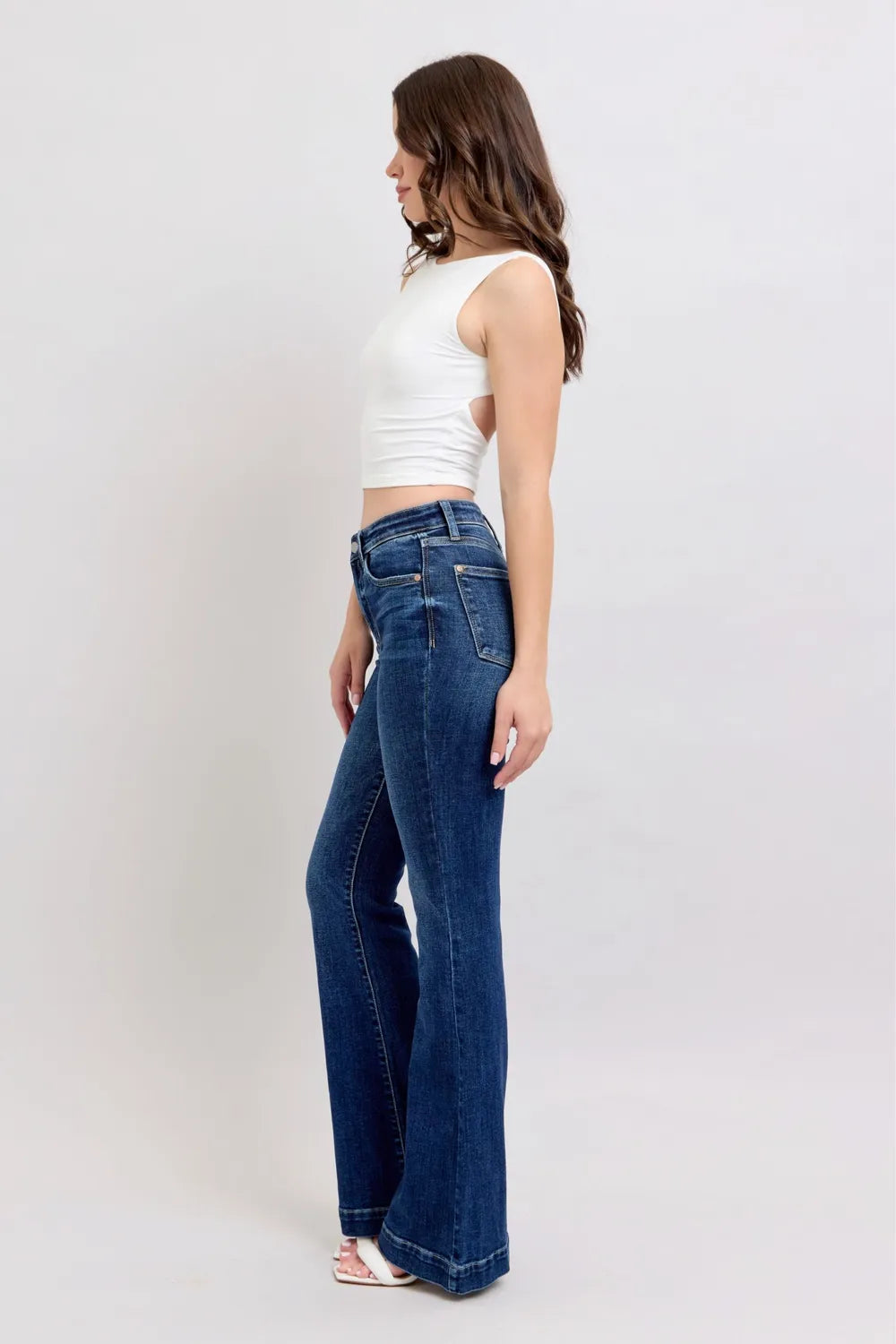 Judy Blue High-Rise Flare Jeans displayed on a hanger, highlighting the classic high-rise waist and flare leg cut.