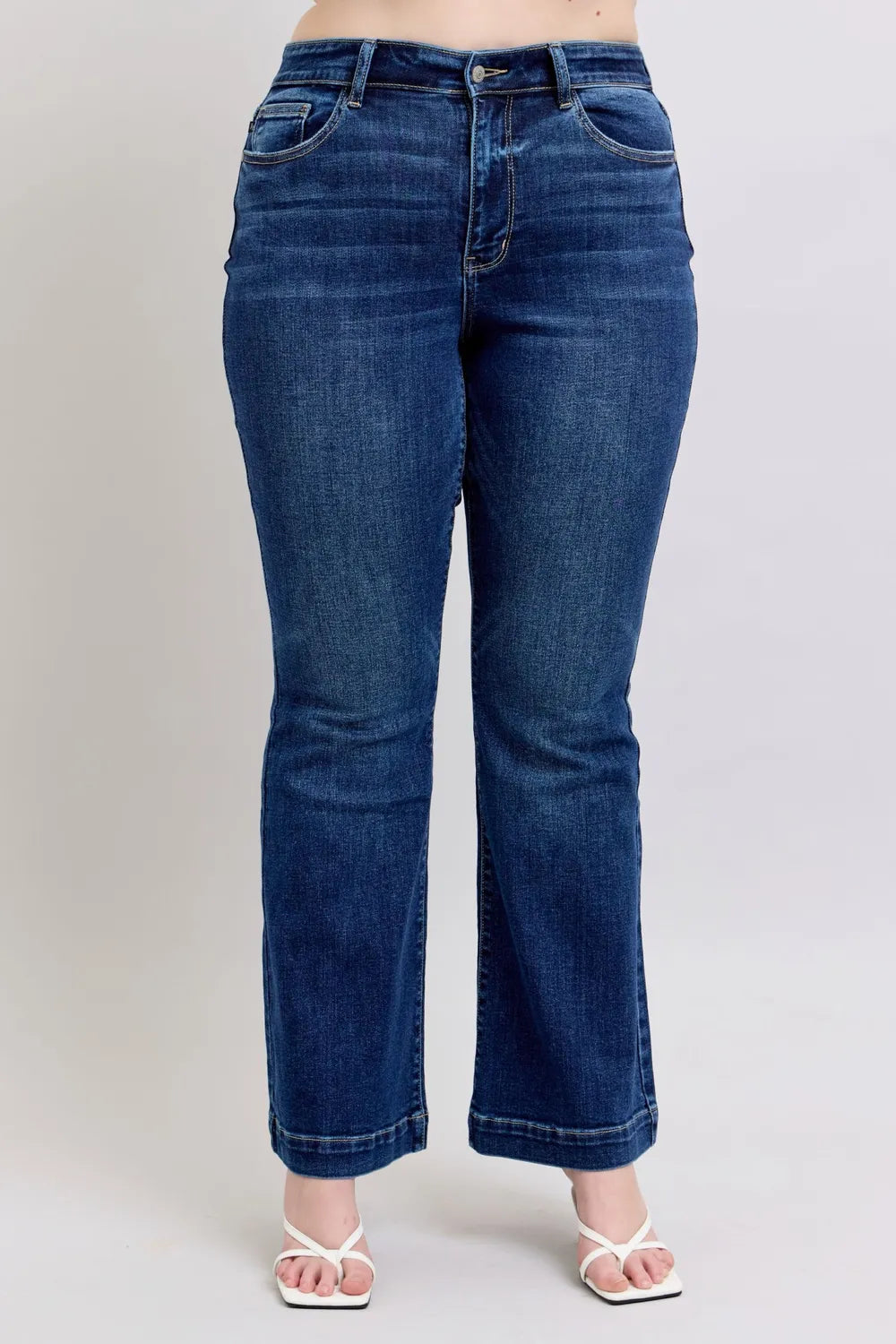 Detailed shot of the flare leg opening of Judy Blue Full Size High-Rise Flare Jeans with pockets, offering a trendy and stylish look.
