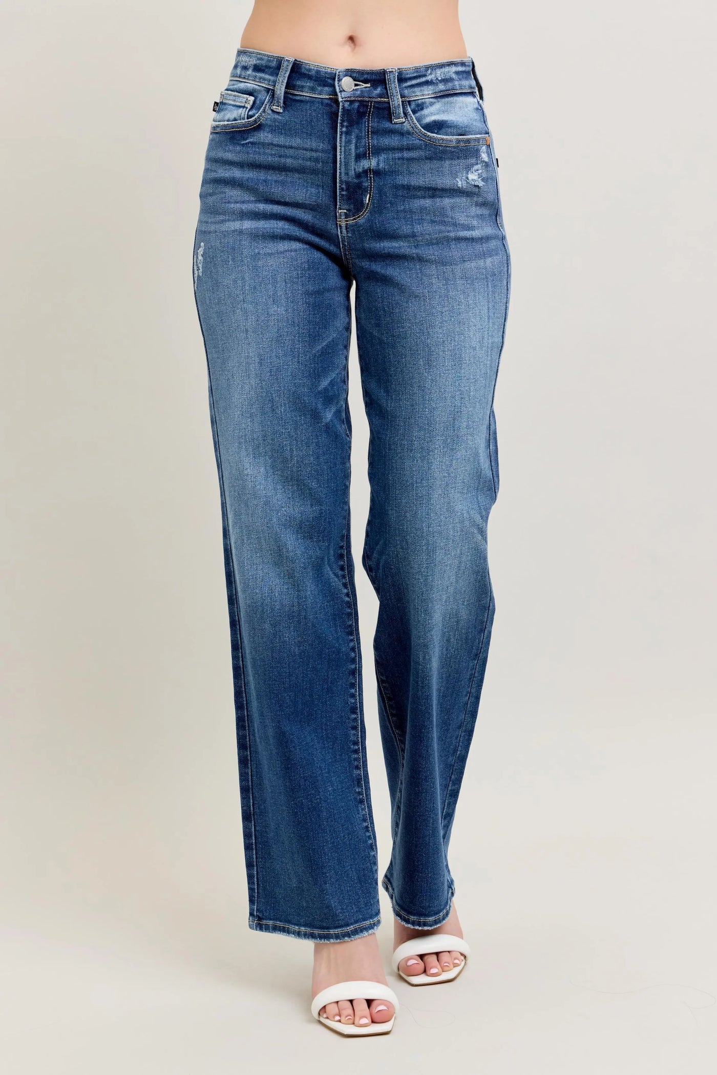 judy Blue Full Size High-Waist 90s Straight Leg Jeans in light blue denim, offering a vintage-inspired fit for plus-size women.