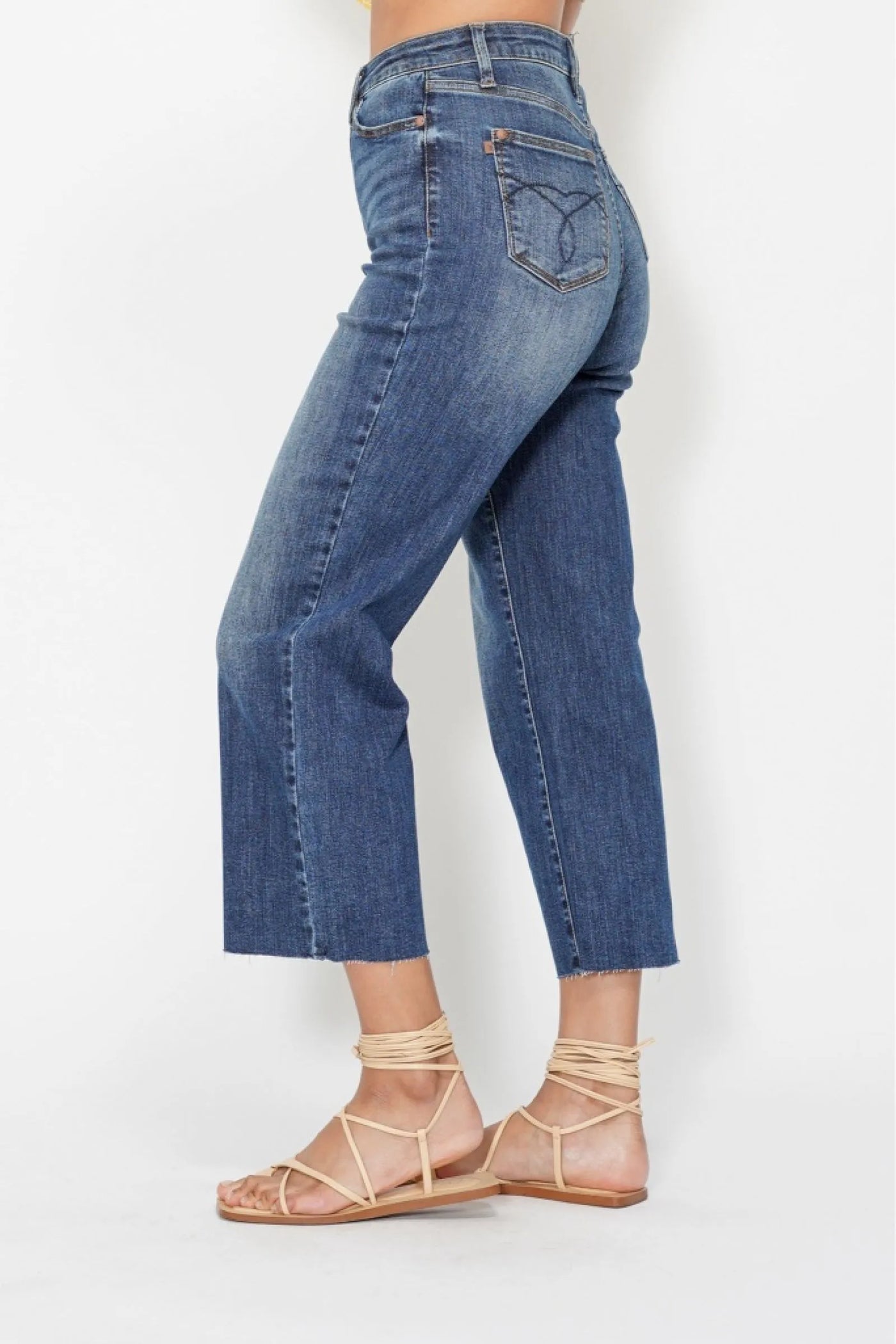 Side view showcasing the fit of Judy Blue High Waist Back Pocket Embroidery Crop Wide Jeans.