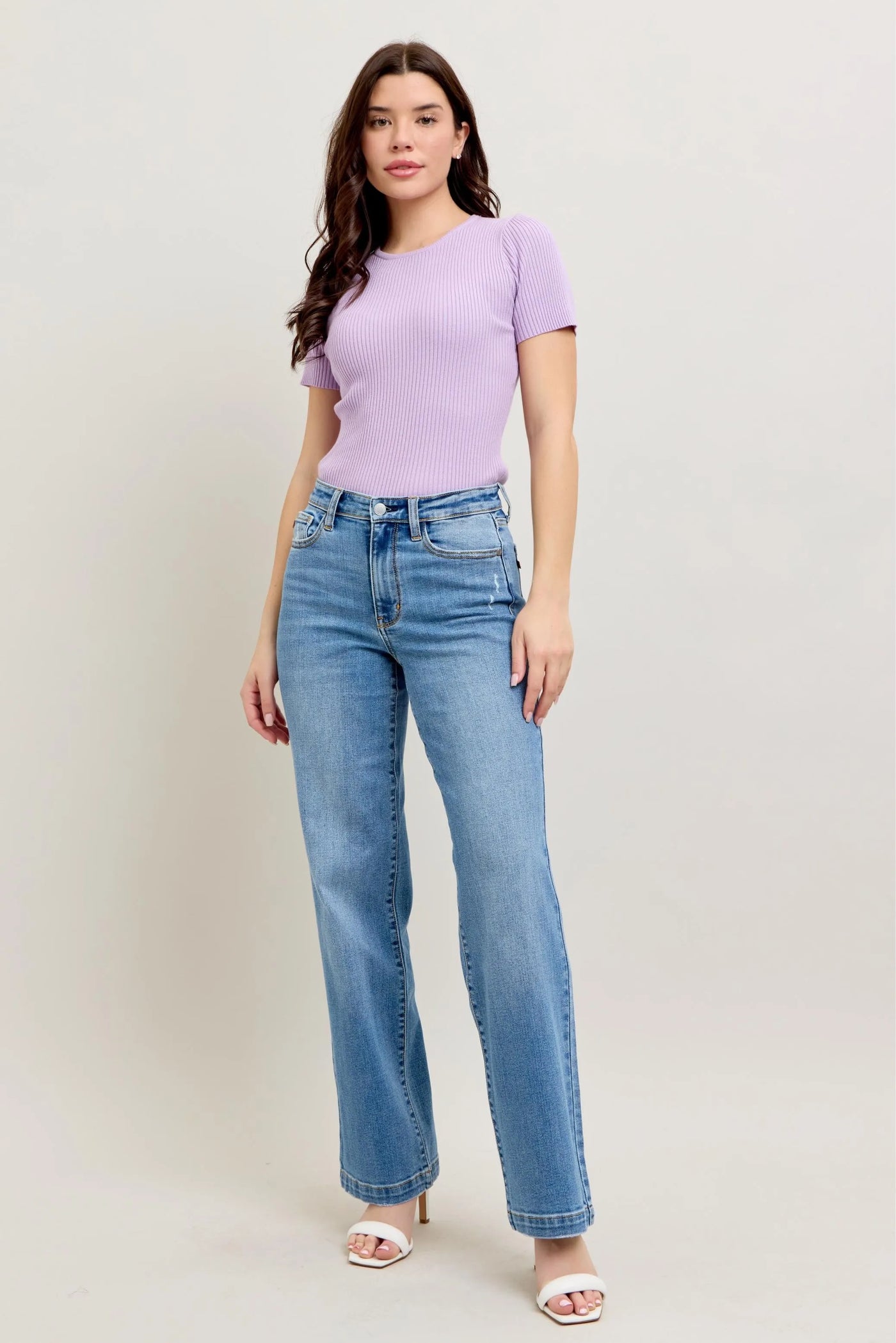 Full-length view of the plus-size model wearing Judy Blue Full Size High-Waist Straight Jeans, highlighting the straight-leg cut.