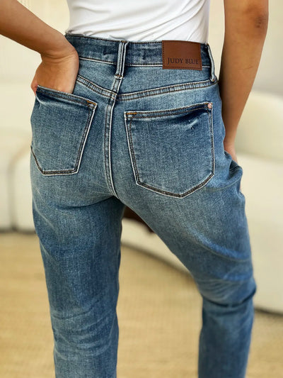 Close-up of the front detailing of Judy Blue Full Size Mid Rise Rigid Magic Release Hem Jeans.