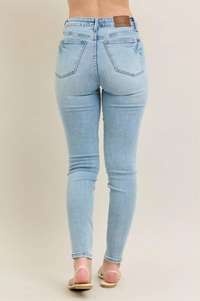 Close-up of the front detailing of Judy Blue Full Size Mid Rise Tummy Control Vintage Wash Skinny Jeans Plus Size.