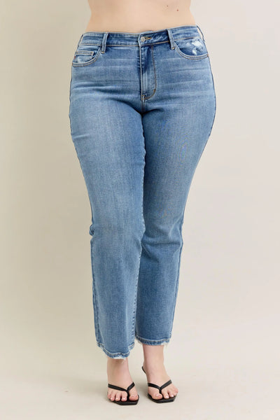 Back view of model wearing Judy Blue Full Size Mid Rise Wash Destroy Hem Bootcut Jeans Plus Size.