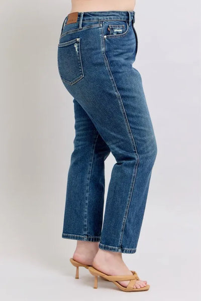 Plus size model showing the fit of Judy Blue Full Size High-Waisted Rigid Straight Leg Jeans, designed to accentuate curves.