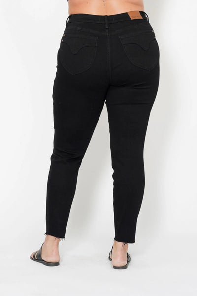 Plus size fit of Judy Blue Full Size High-Waisted Skinny Jeans, designed to accentuate curves with tummy control.