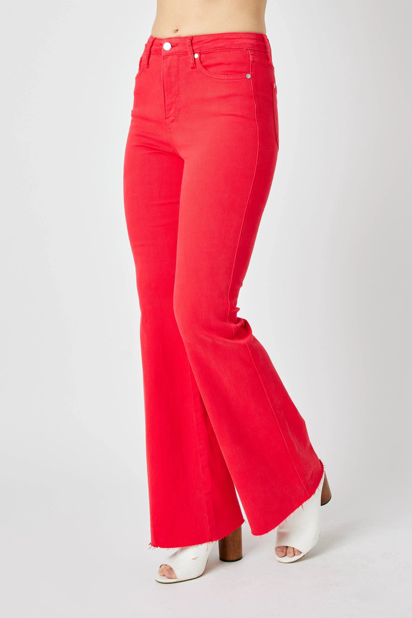 Back view showcasing the fit of Judy Blue Full Size High-Waisted Tummy Control Garment Dyed Flare Jeans in Red.