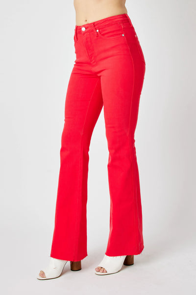 Close-up of the front detailing of Judy Blue Full Size High-Waisted Tummy Control Garment Dyed Flare Jeans in Red.