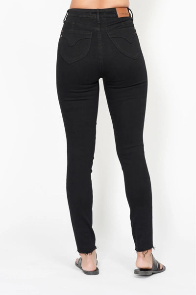 Judy Blue Full Size High-Waisted Skinny Jeans featuring large shield pockets and a flattering fit for plus size women.
