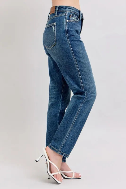 Close-up of the front pleats and high-waisted design of Judy Blue Full Size High-Waisted Straight Leg Jeans.